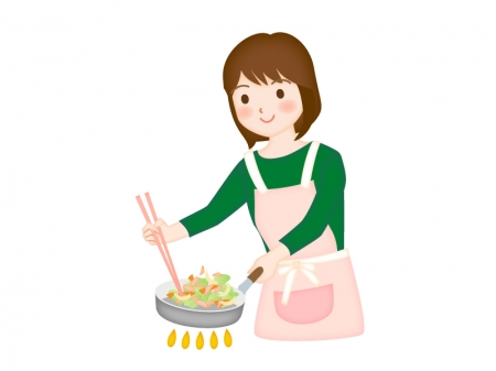 料理をしている女性のイラスト素材
