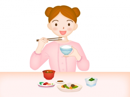 和食を食べている女性のイラスト素材