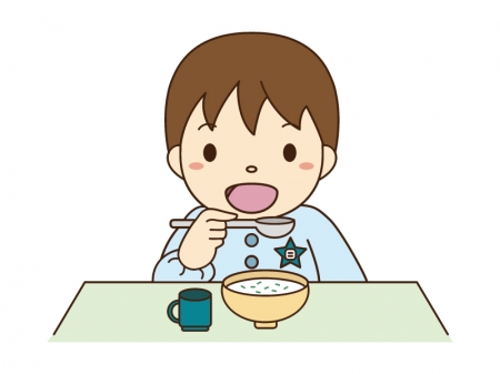 七草粥を食べている男の子のイラスト素材