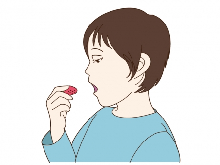 苺を食べている子供のイラスト