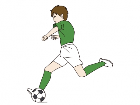 サッカーでシュートする少年のイラスト