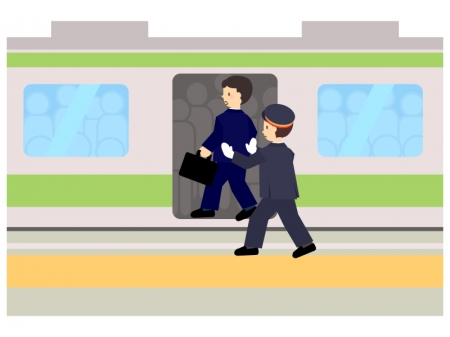 通勤ラッシュで駅員に押し込まれているイラスト